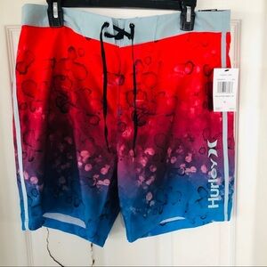 NWT HURLEY splatter red & blue sits above knees men’s swim trunks Size 32